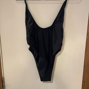 High cut black one piece bathing suit